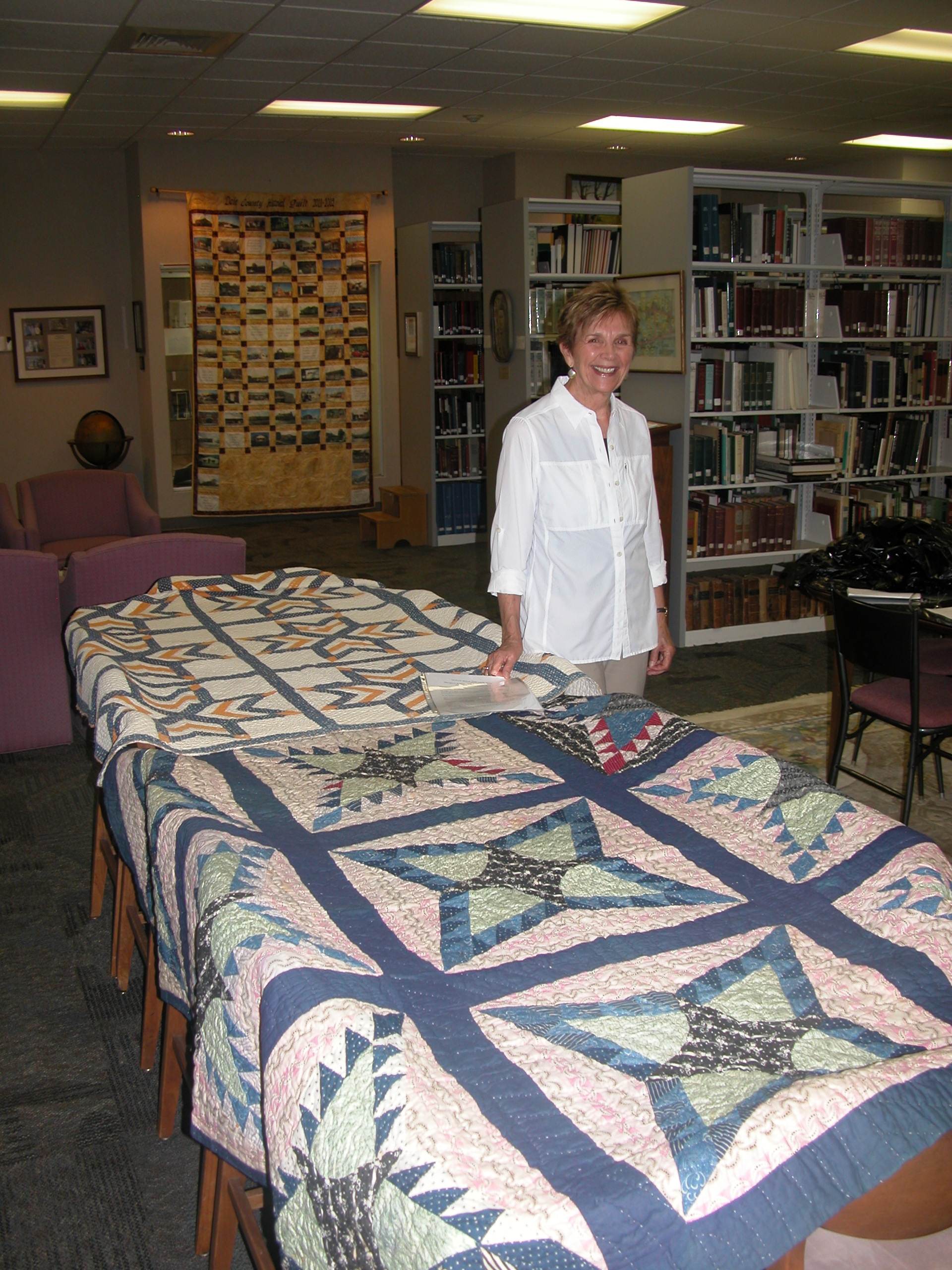 Image of Margaret Roberts Click Nail with quilts